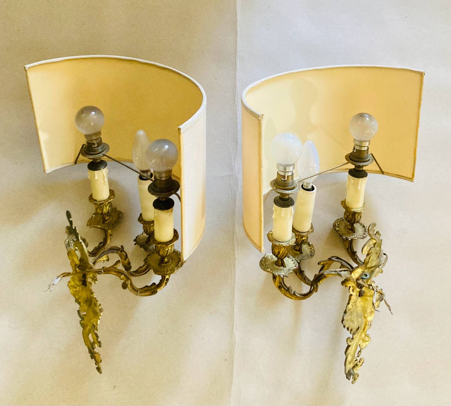 Louis XV gilt bronze wall lights from the 19th century with lampshades