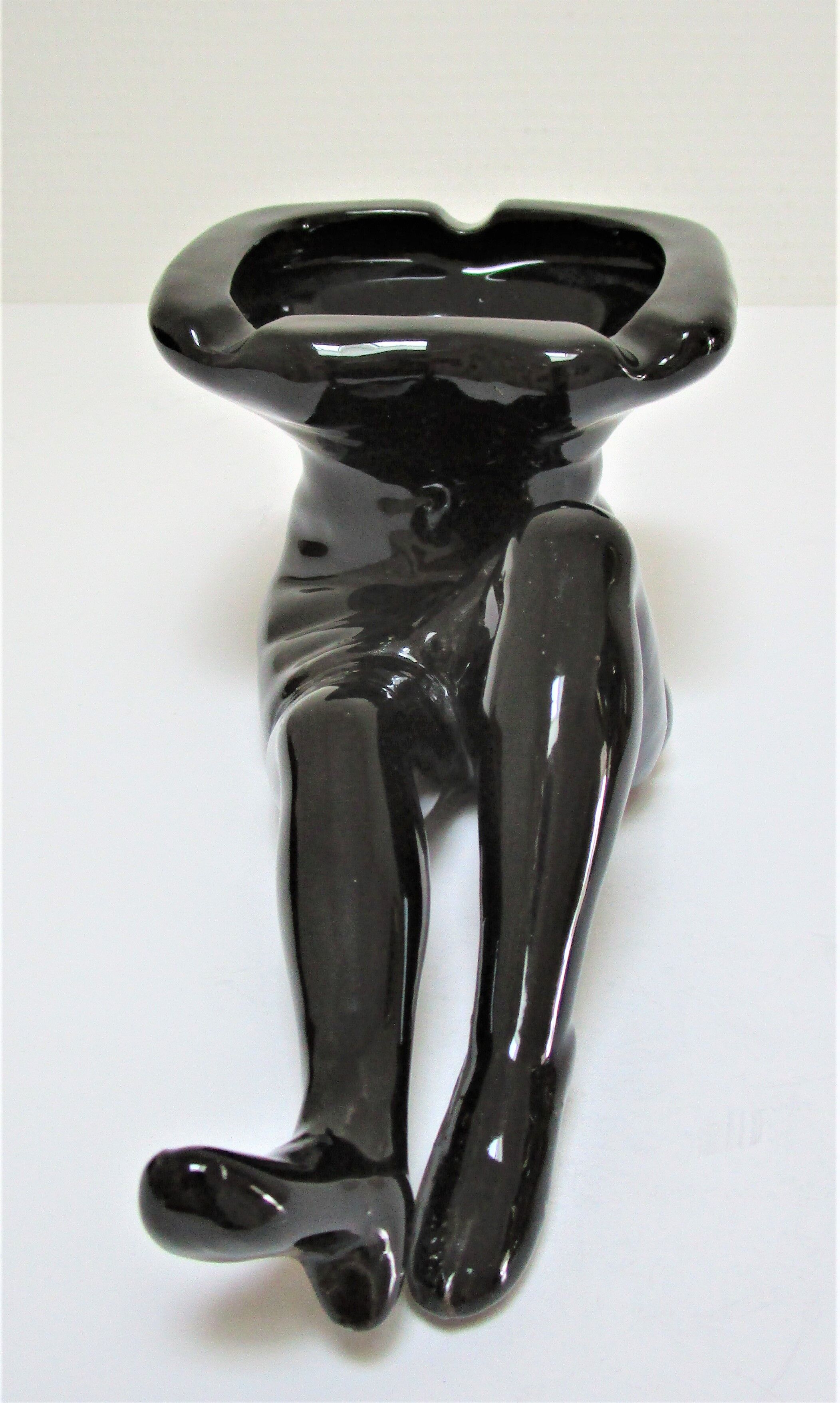 Anthropomorphic ashtray legs ceramic black design 80s