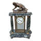 Pendule portique et cage XXème bronze signé cartier