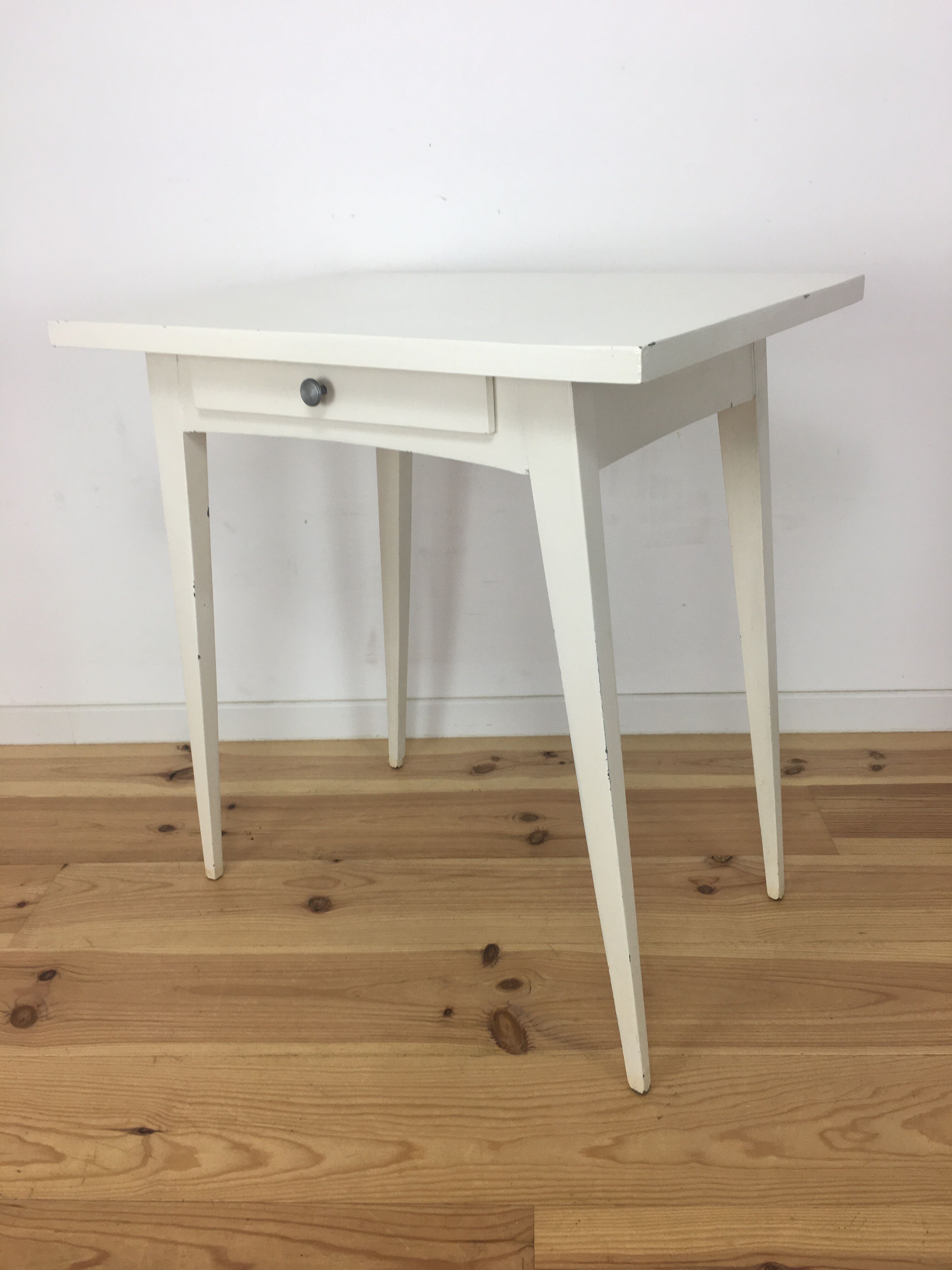 White wood desk foot compass