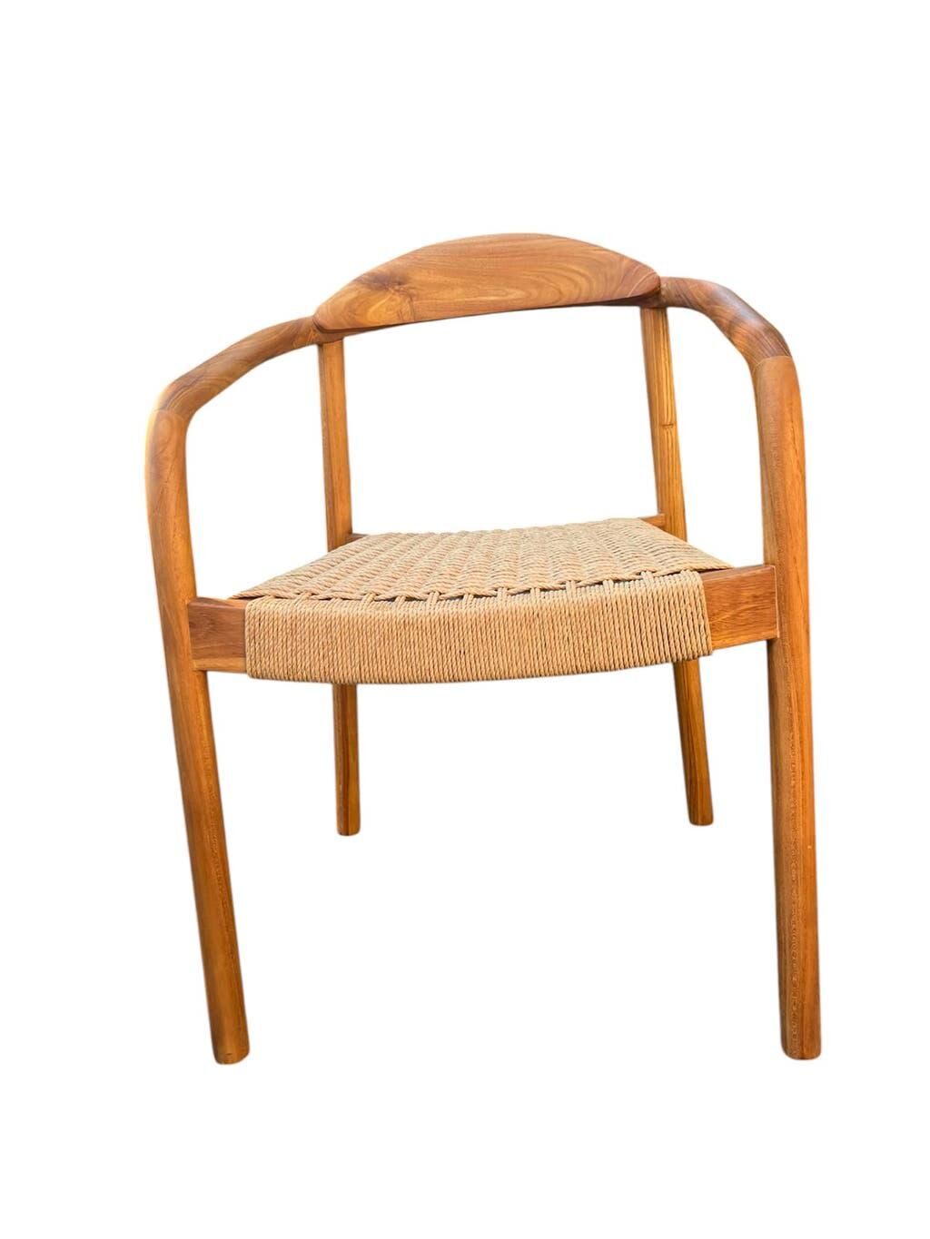 Set of 4 solid wood chairs with cord and armrests.