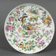 Porcelain plate of Canton XIXth decoration of butterflies and bird