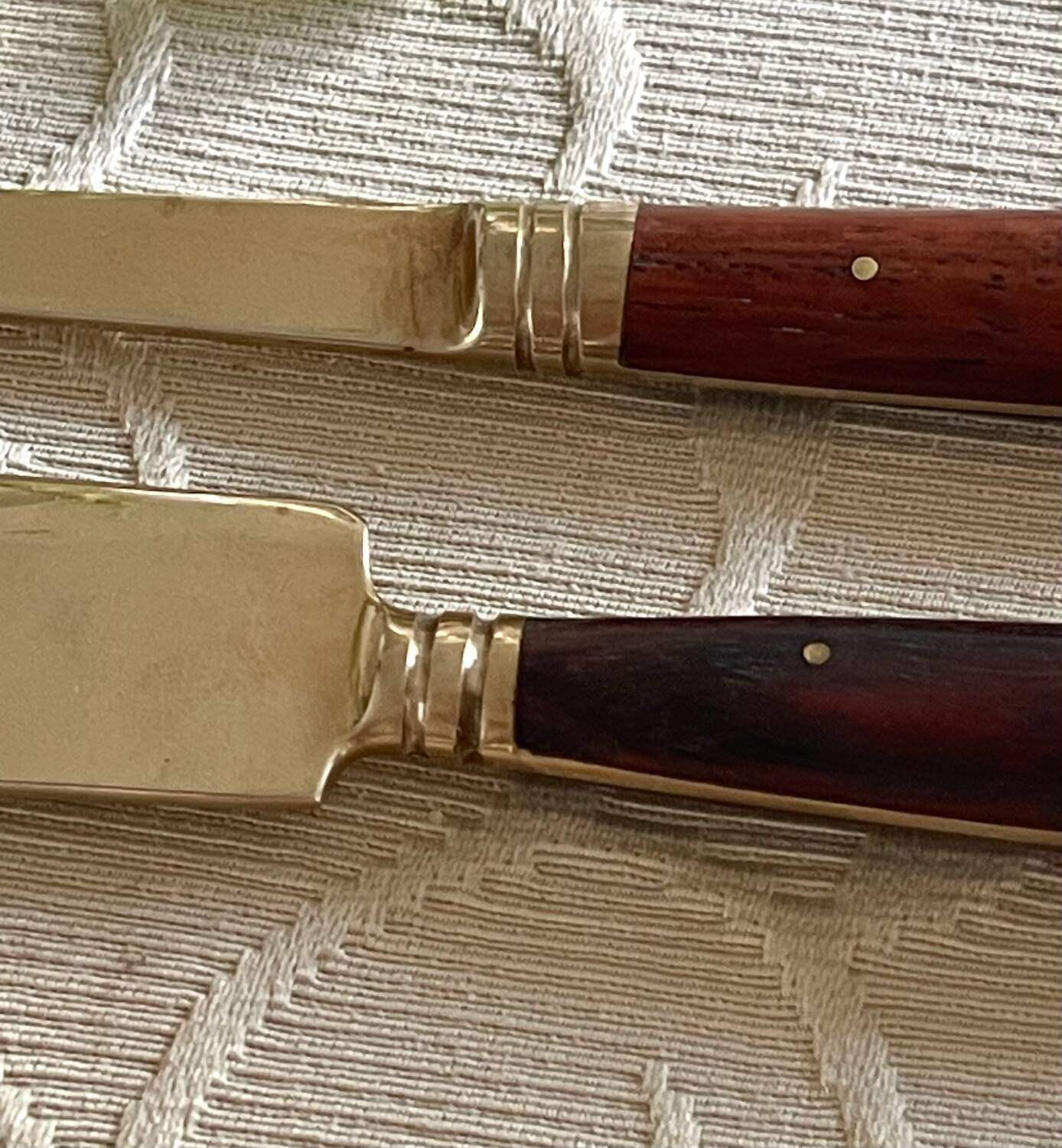 Service cutlery, brass and rosewood.