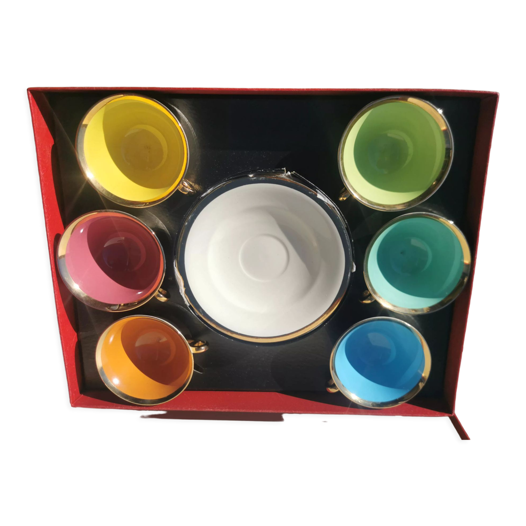 Set of coffee cups and faience saucers from Salins
