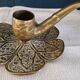 Brass candle holder.