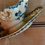 Old gravy boat on frame in terre de fer earthenware by gien, “chardons” model in blue-green