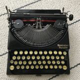Machine à écrire remington portable en état de marche