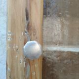 Antique wooden bathroom cabinet patinated