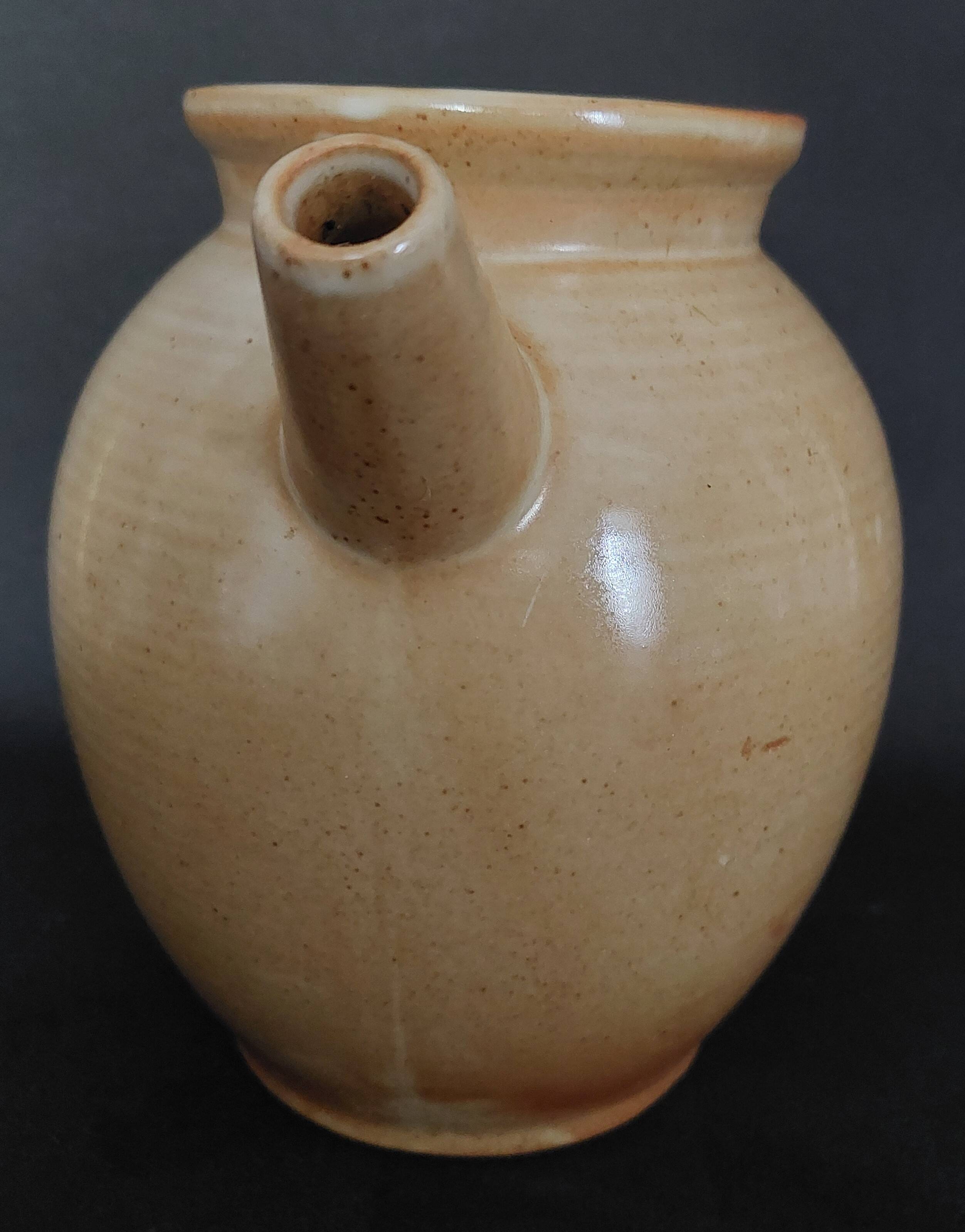20th century village stoneware goat jug