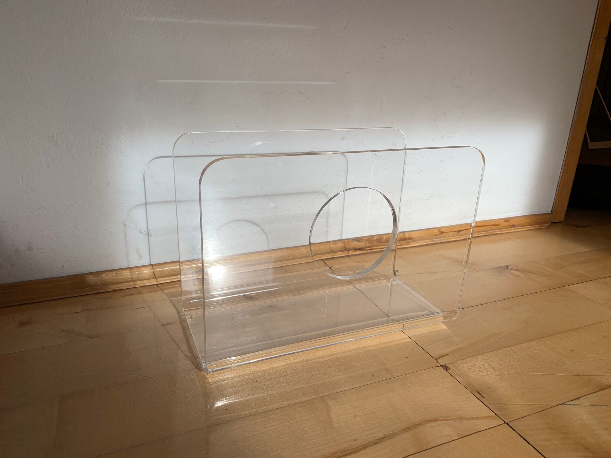 Lucite newspaper stand, 1970s