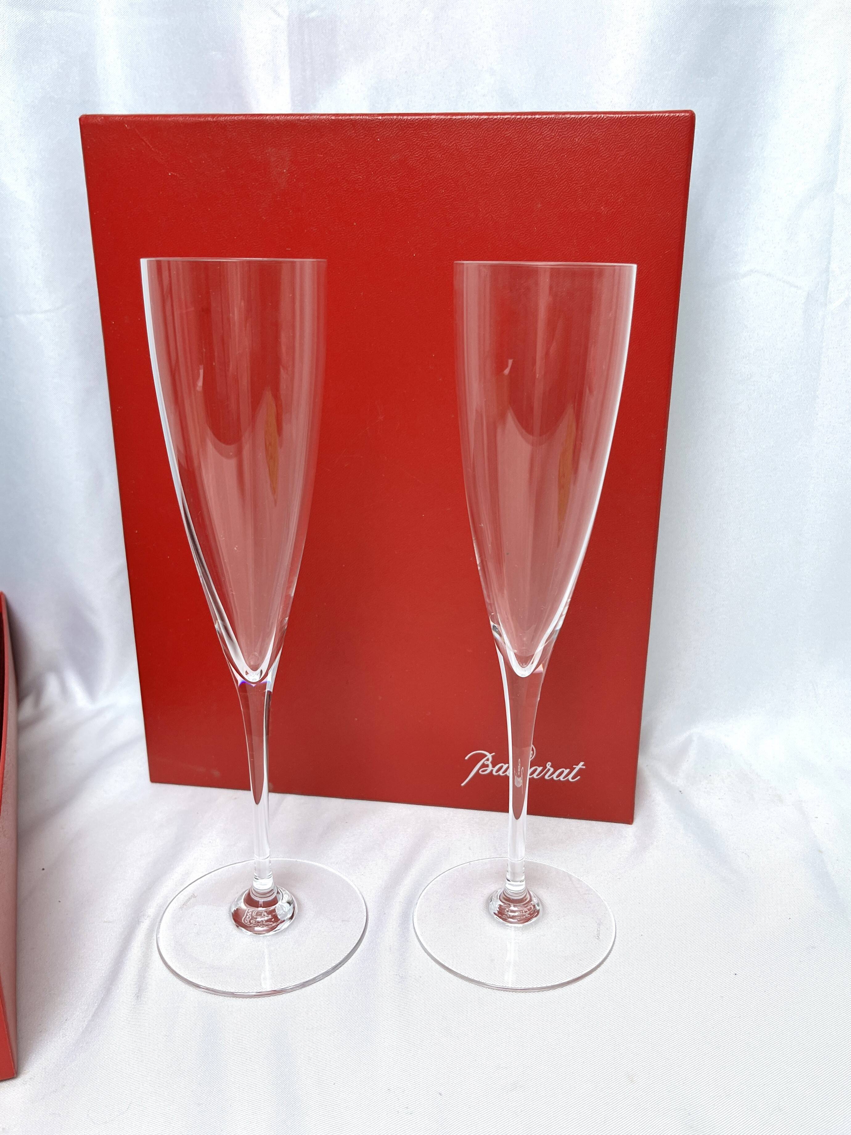 Baccarat, two Dom Pérignon crystal champagne flutes