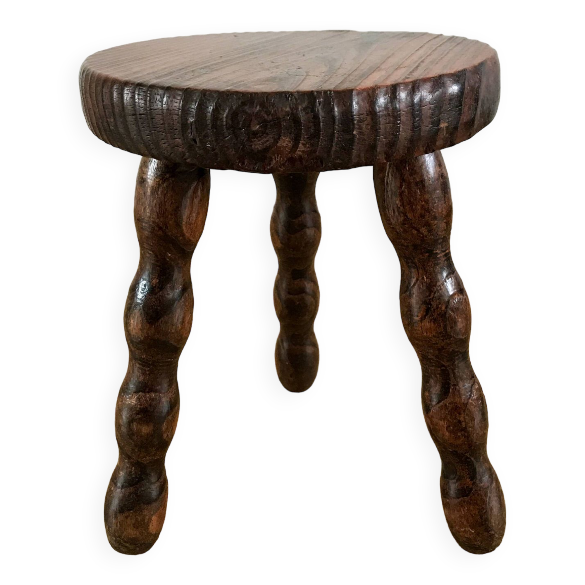 low stool in solid turned wood from the 70s