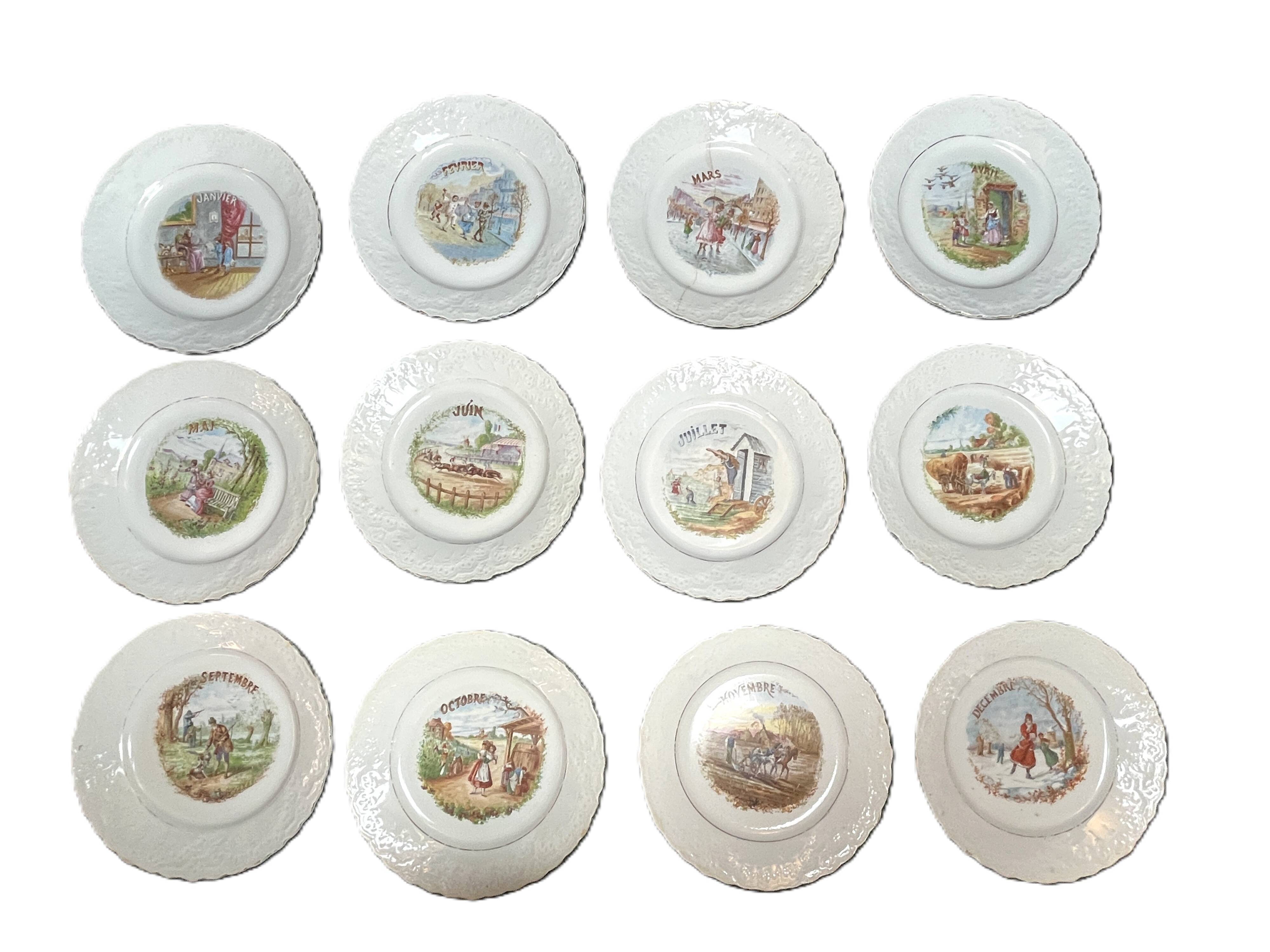 Arts de la table, douze assiettes dessert mois de l’année vers 1930