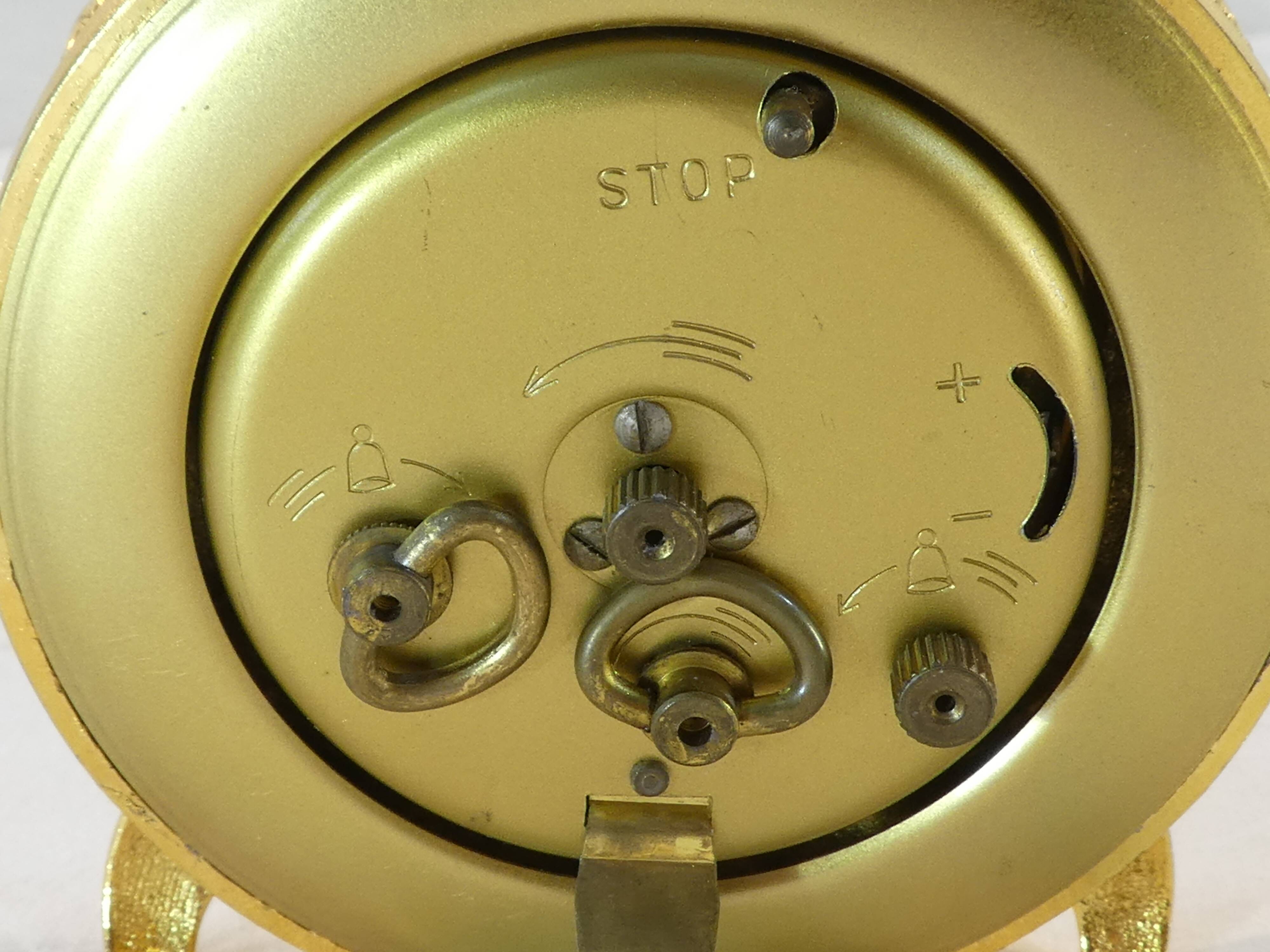 LANCEL alarm clock in chiseled bronze and gilded metal