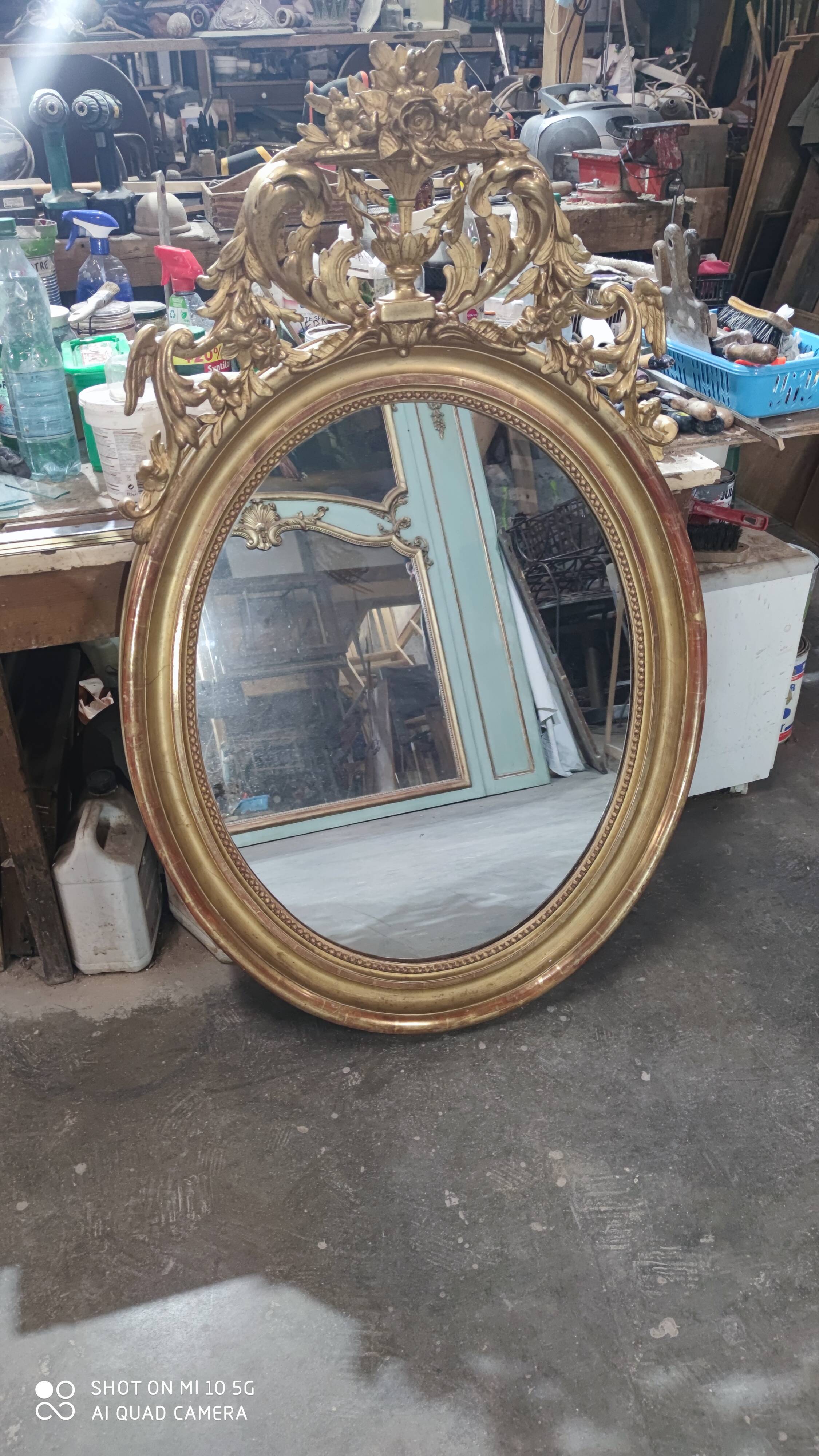 Mirror with a gilt medallion pediment, 1840