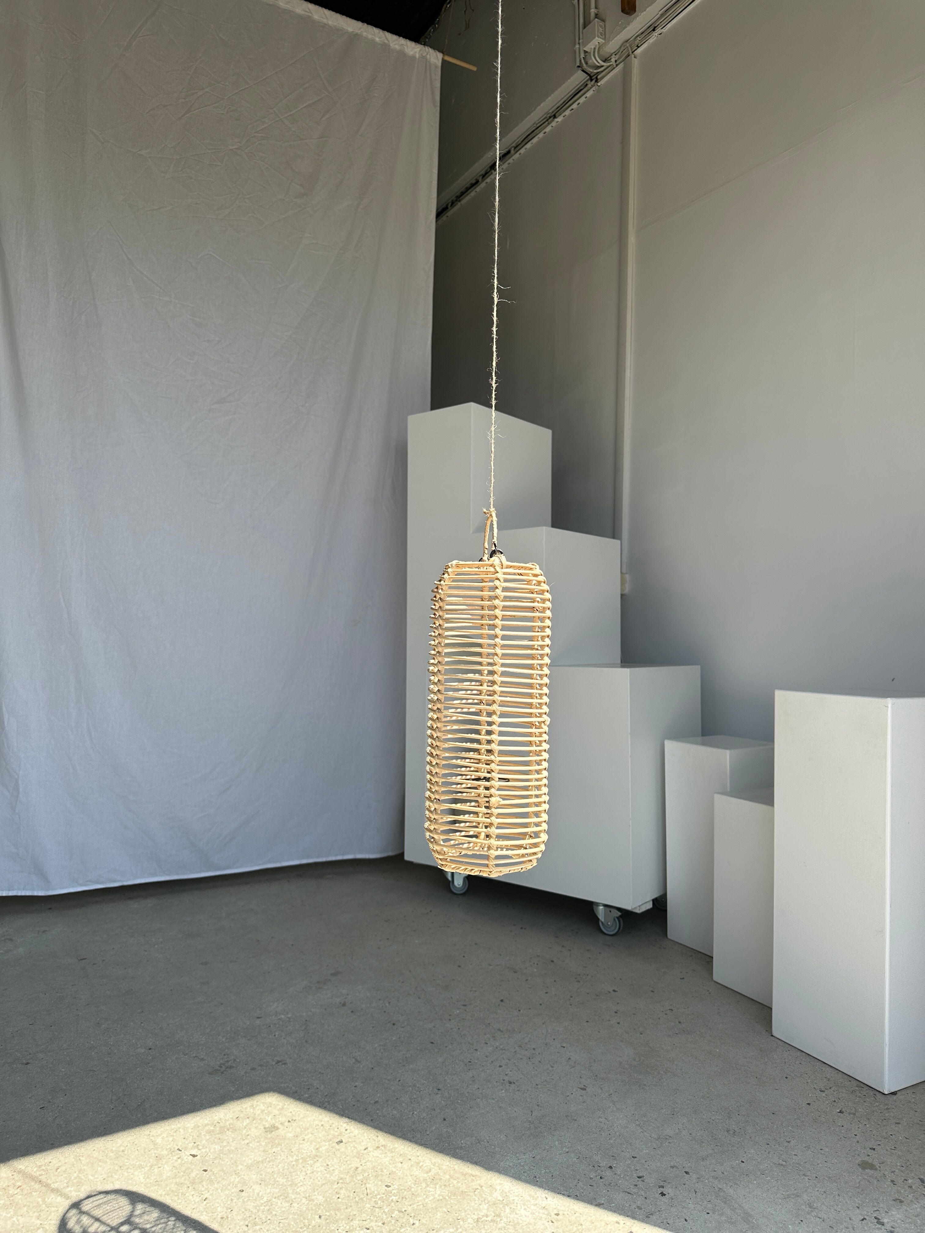 Small lantern-shaped rattan suspension H35 D15