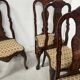 Set of eight Dutch marquetry chairs from the 19th century.