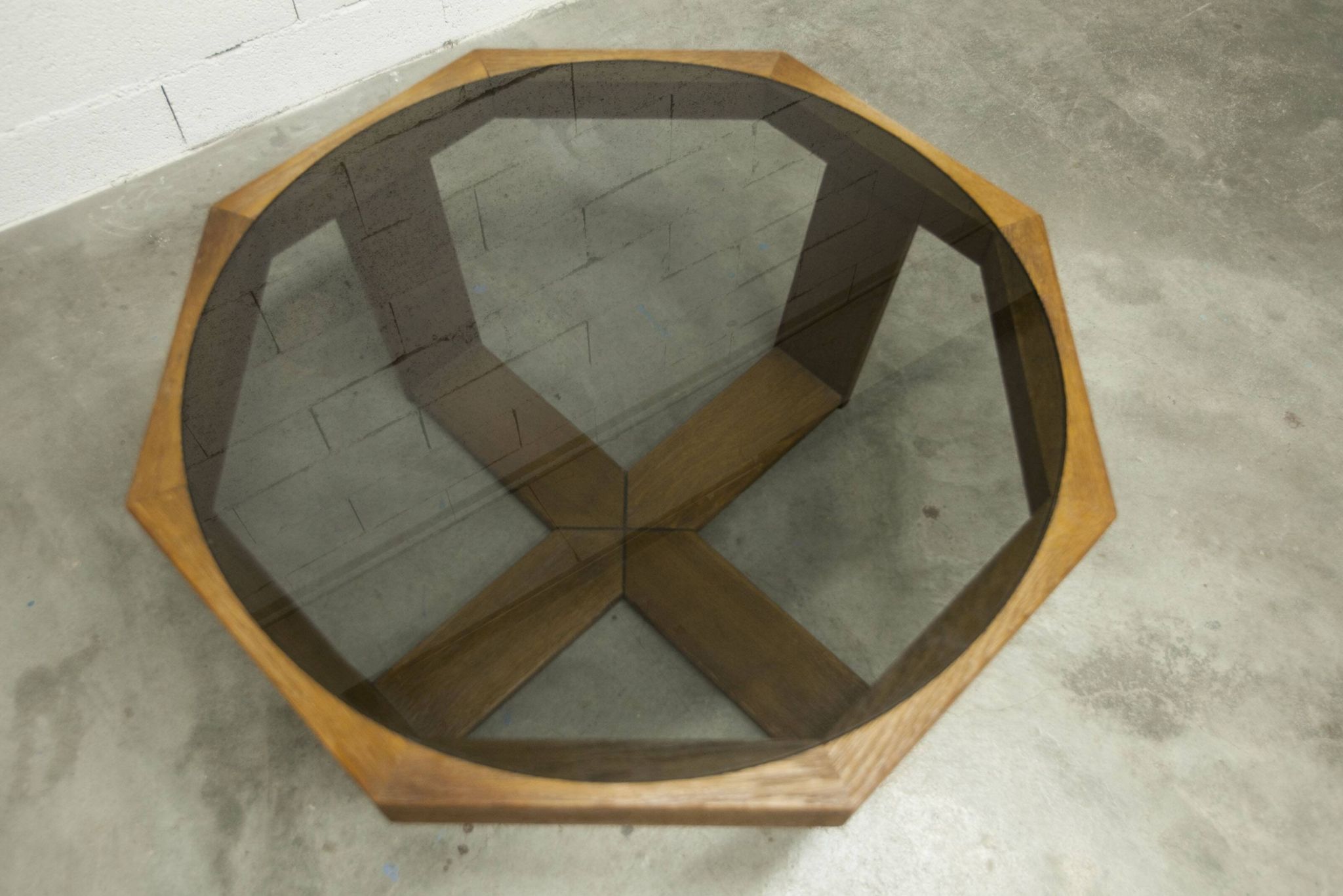 Unique hexagonal table 1977, smoked glass and oak, Swiss made.