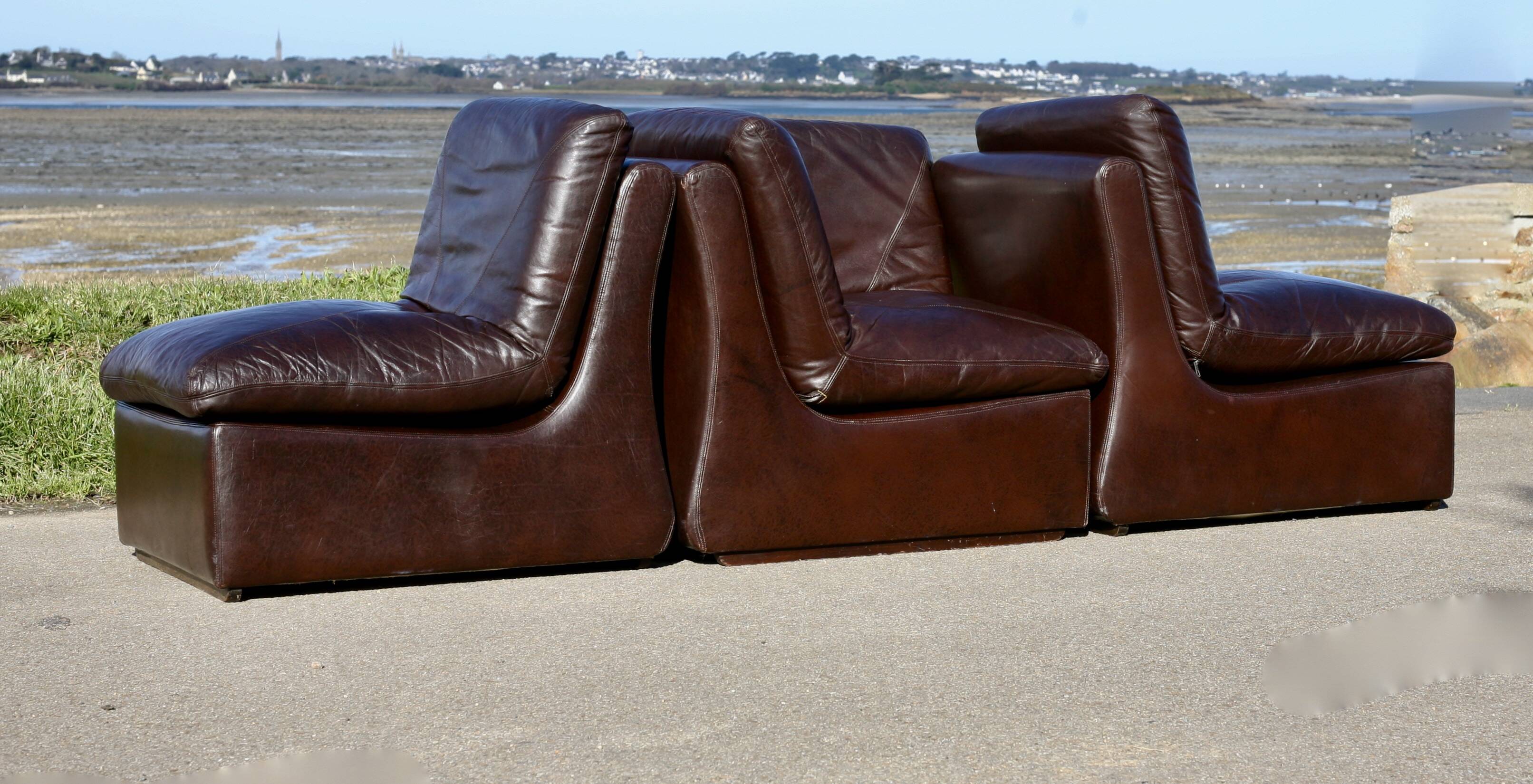 Modular sofa made up of 3 leather armchairs. Circa 1970