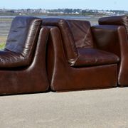 Modular sofa made up of 3 leather armchairs. Circa 1970