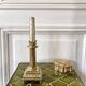 Empire style gold candle holder