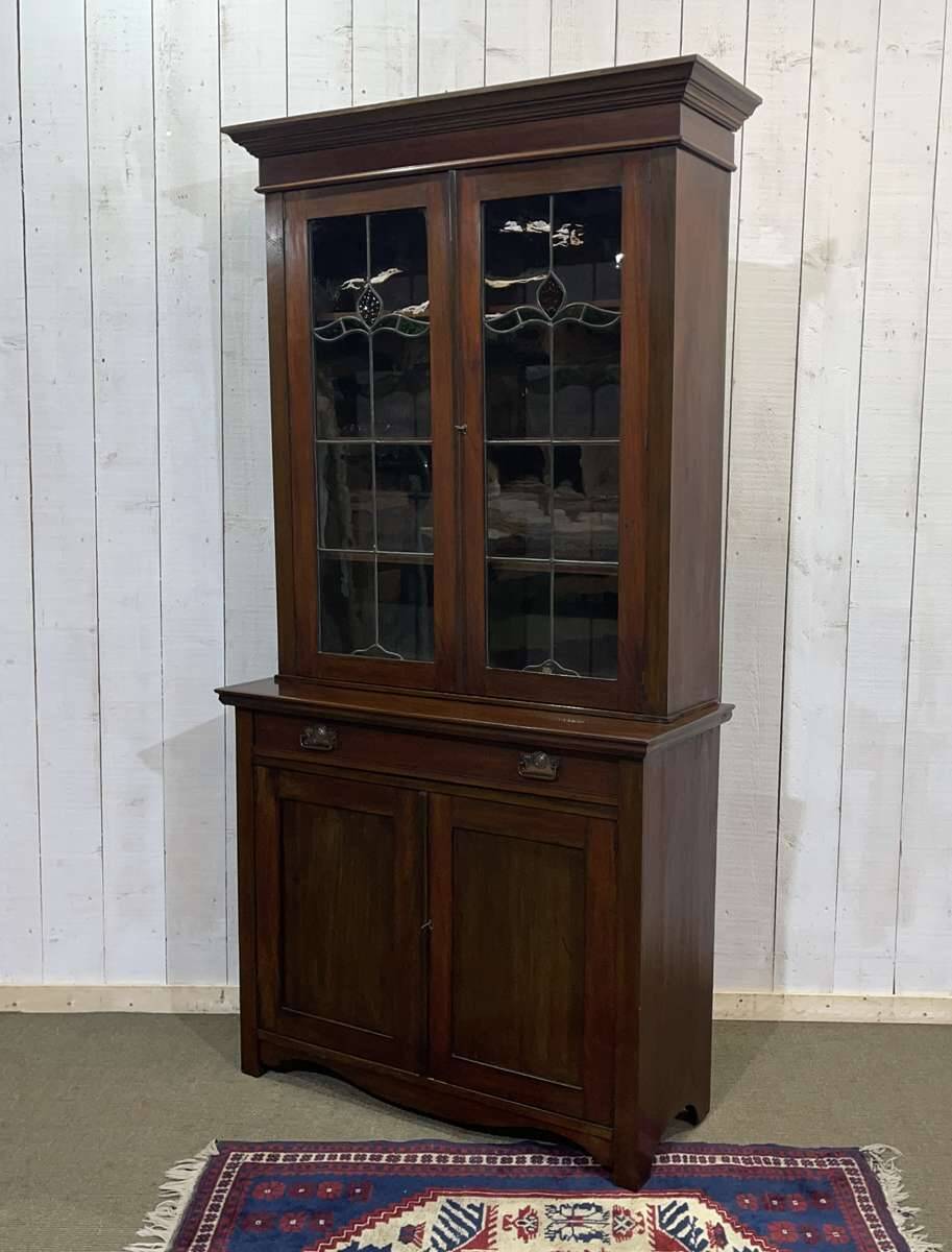 Early 20th century English two-section mahogany bookcase
