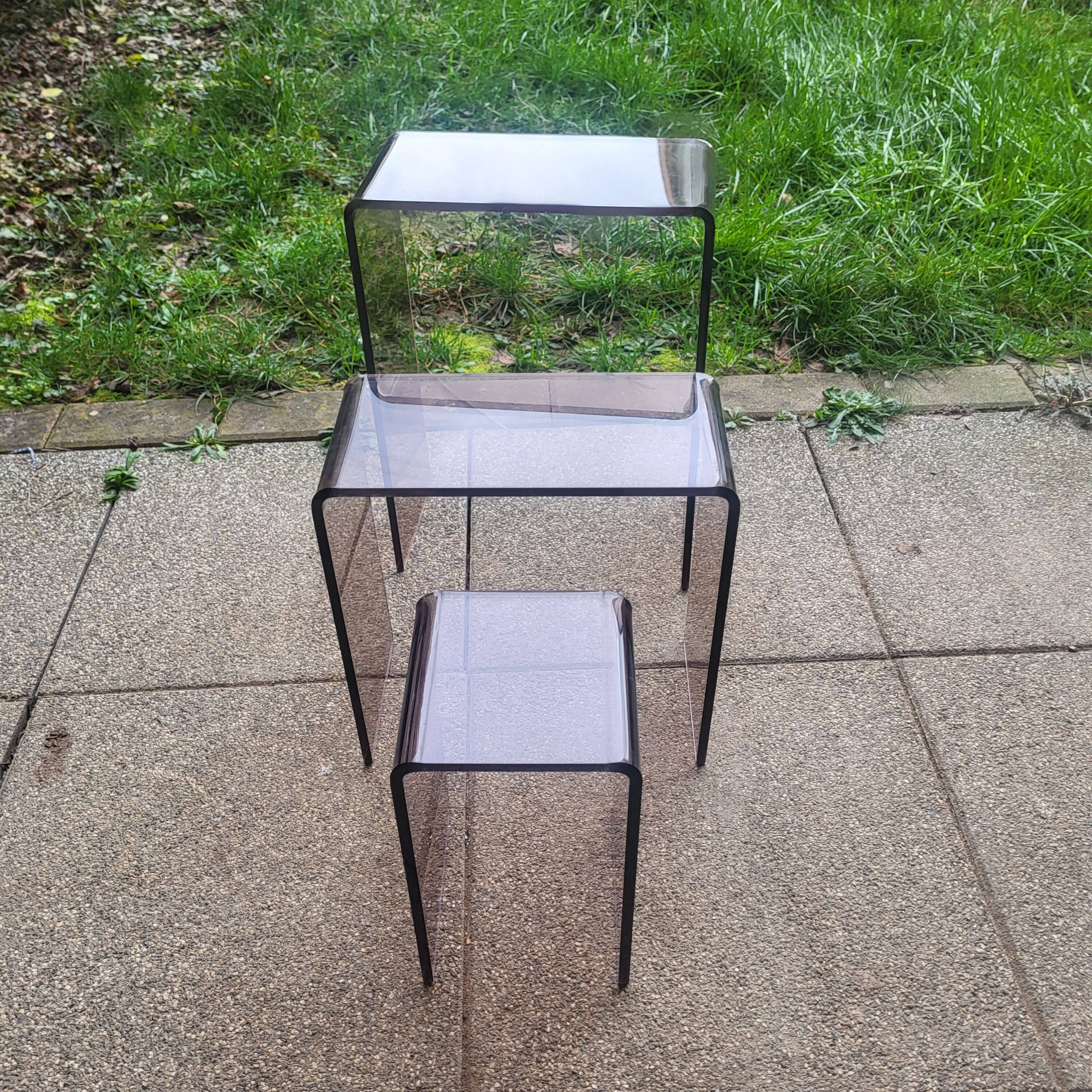 3 side tables, occasional table in smoked plexiglass, 1960s-70s.