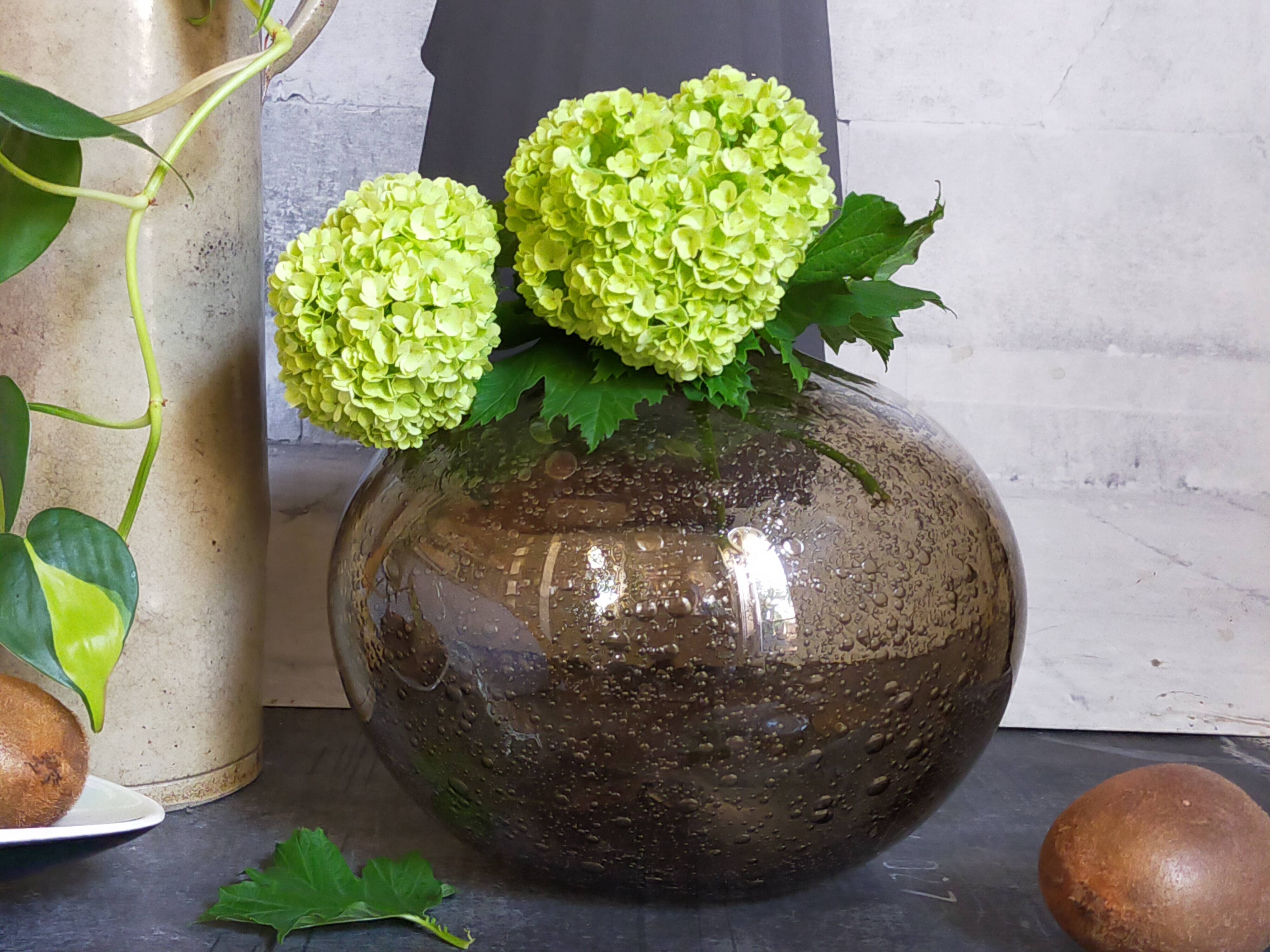 Vintage bubble-blown glass ball vase from riom france