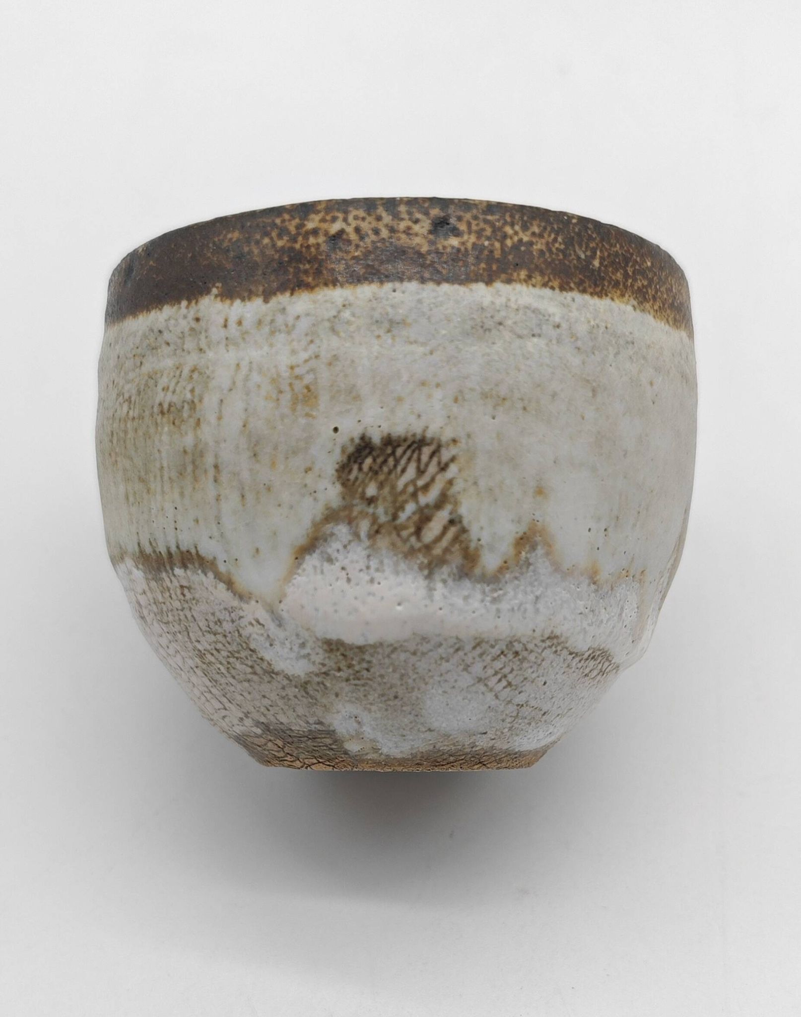 Trilogy of cups or Japanese-style goblets by the Danish ceramist Gutte Eriksen using RAKU technique.