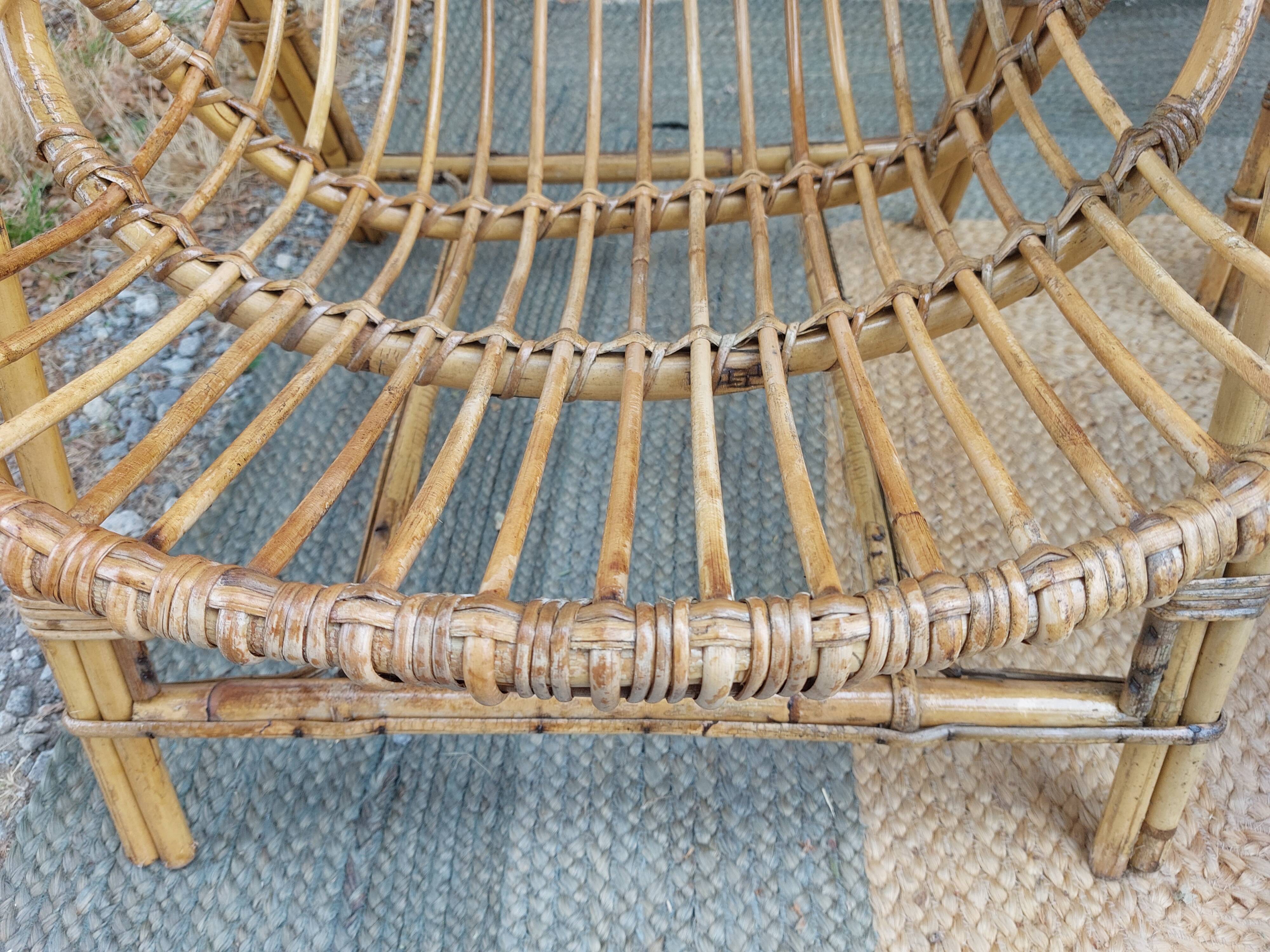4 armchairs and a coffee table made of rattan and bamboo wood, vintage.