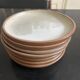 7 stoneware plates 1970