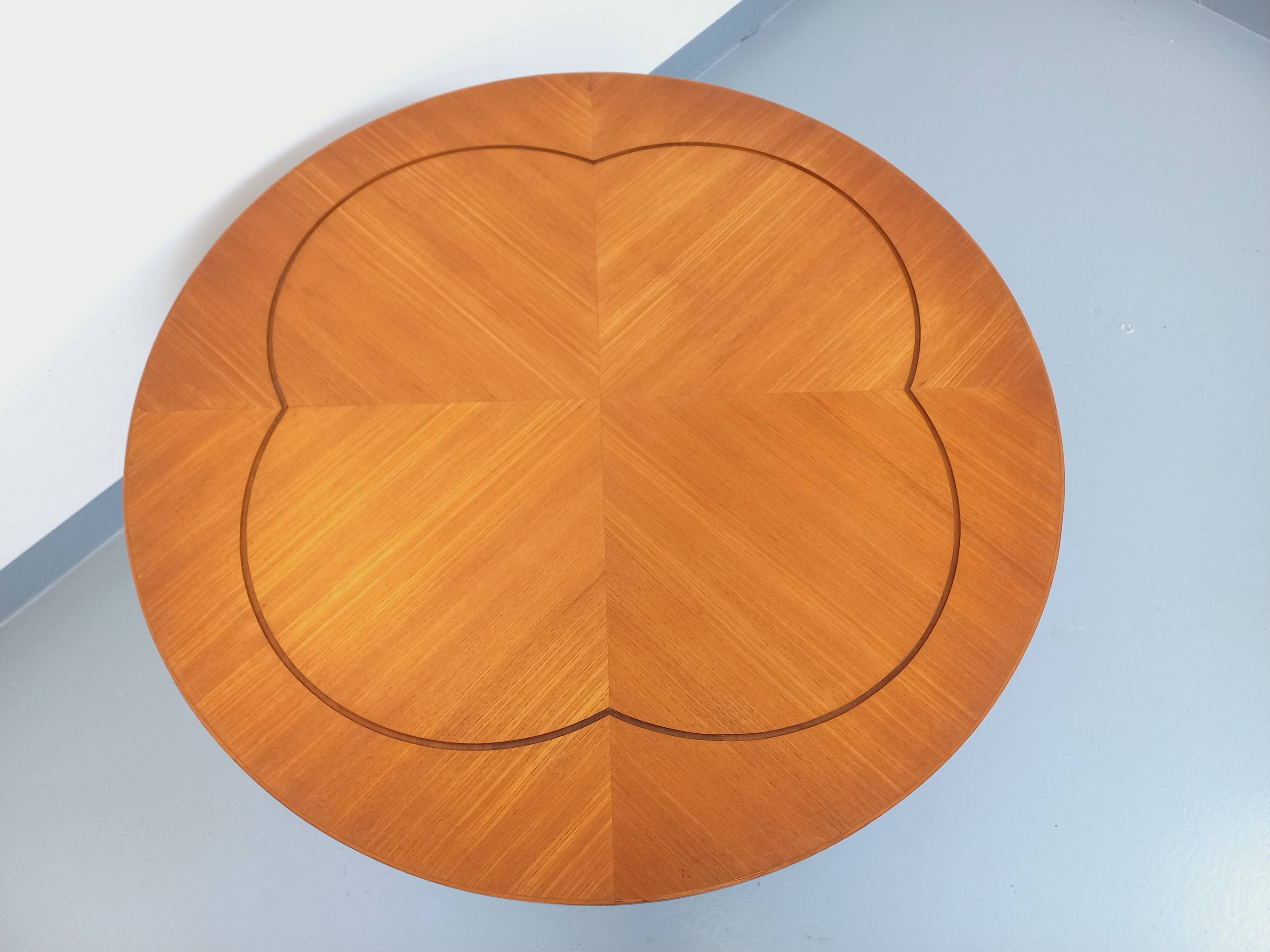 Vintage English round teak coffee table from the 1960s