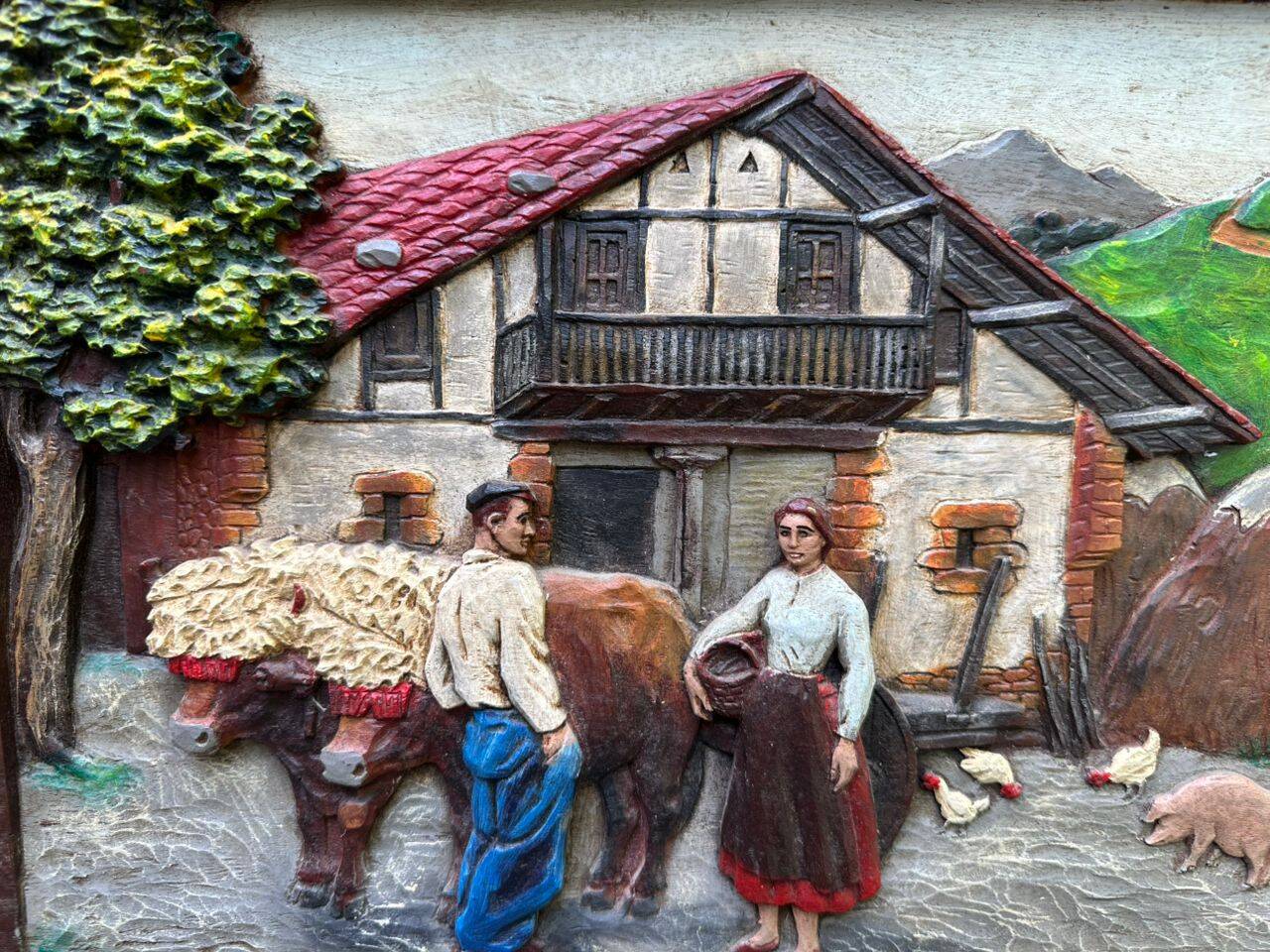 Wooden bas-relief panel, carved and painted