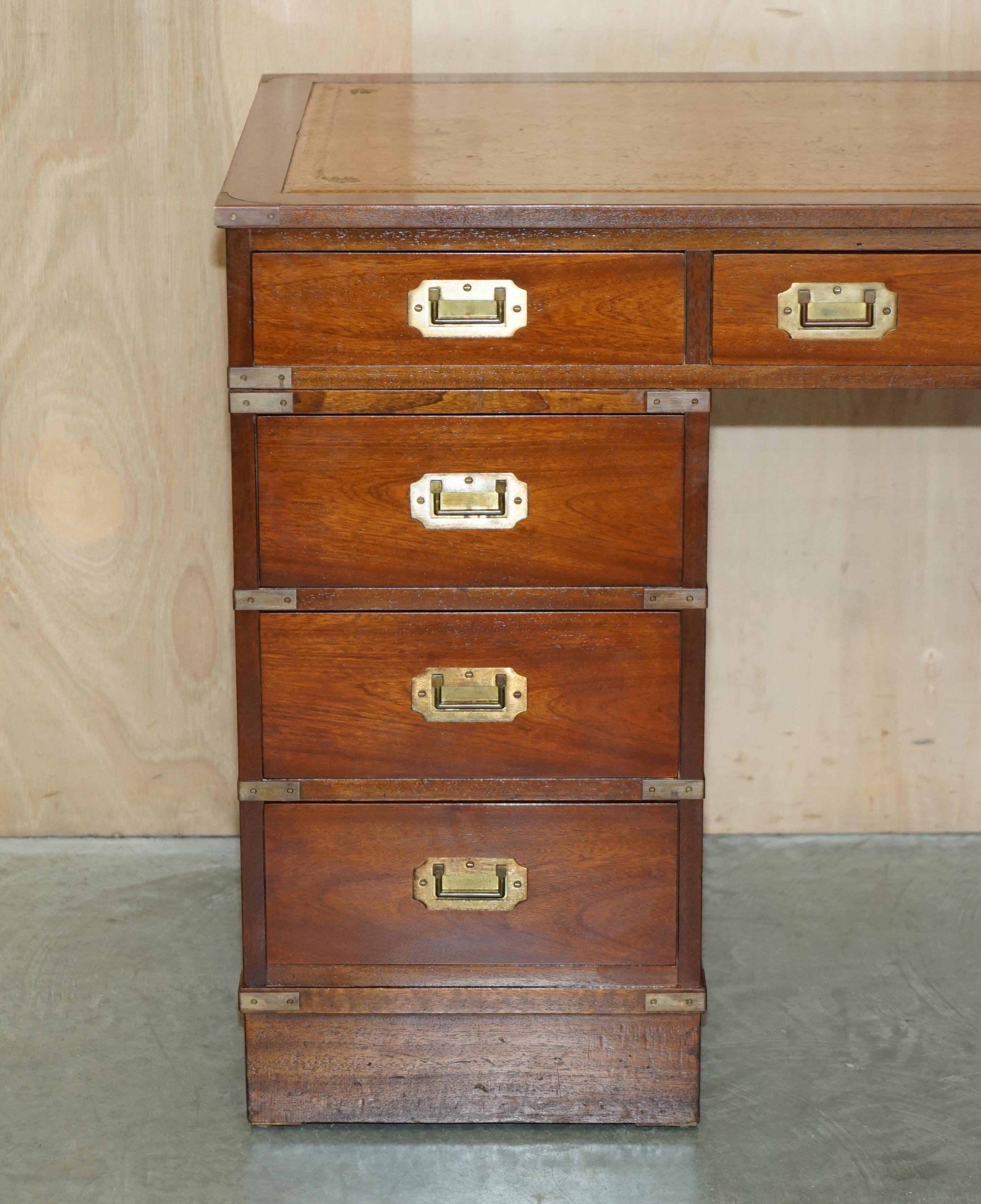 Vintage Harrods Kennedy desk in military campaign style with drawers.