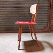 Chaise en bois rouge ton  1960