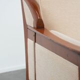 Art Nouveau design armchair with a luxurious light fabric upholstery