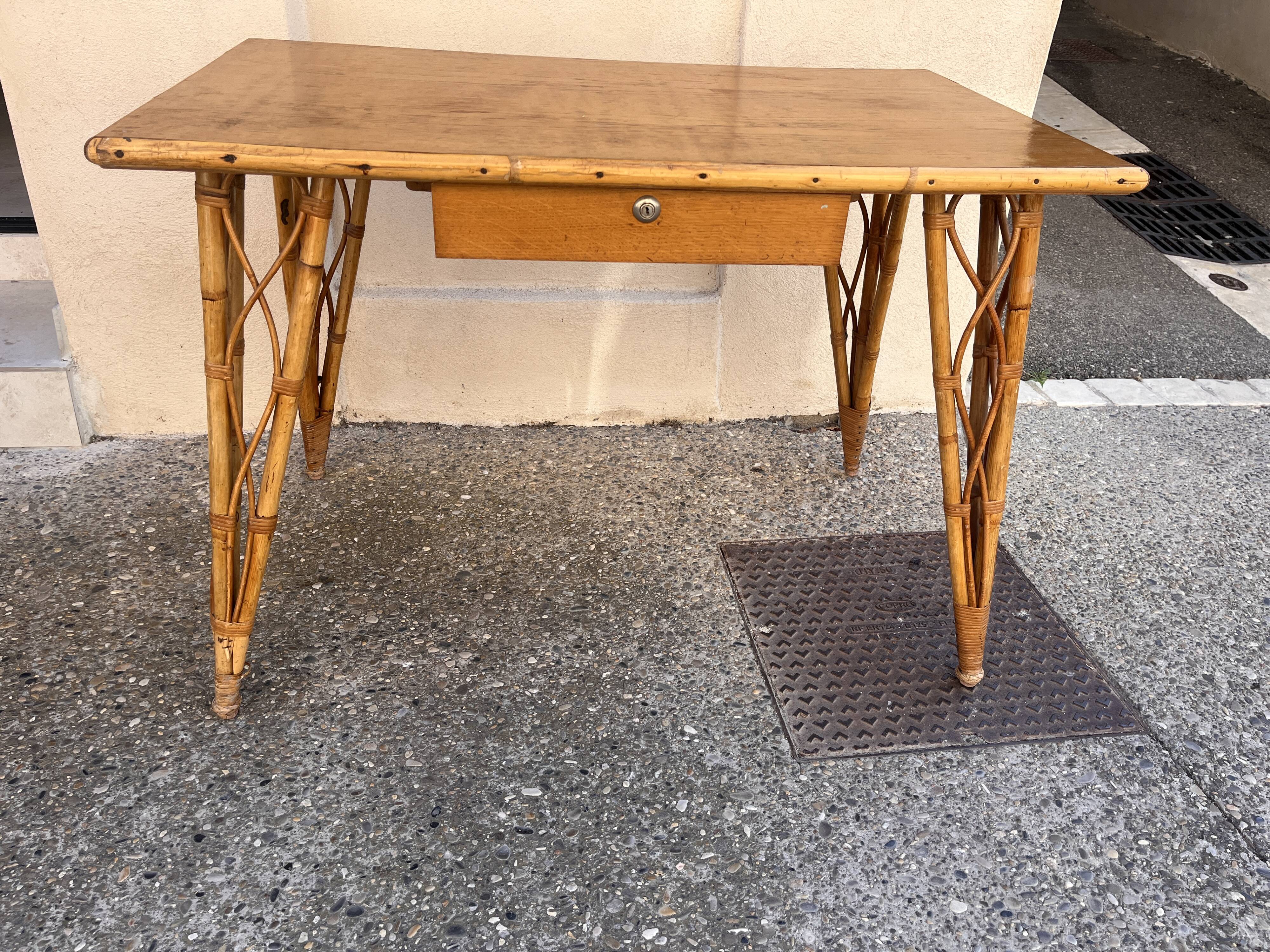 vintage 1960s rattan desk with Eiffel Tower legs