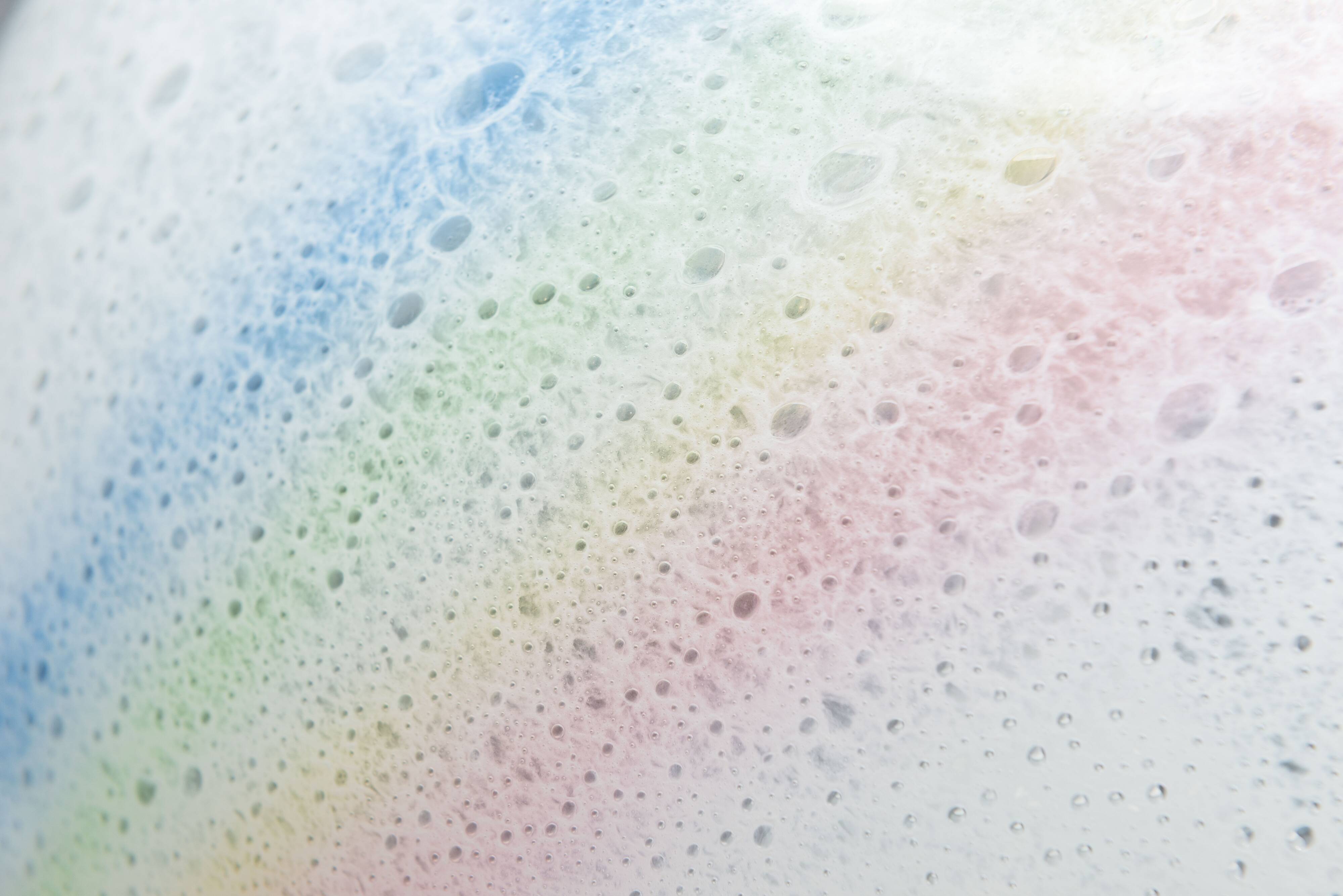 Doria table lamp in bubble glass with rainbow coloured details