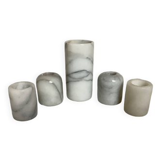 Five marble candlesticks