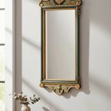 Antique full-length wall mirror in carved wood