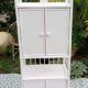 White rattan shelf