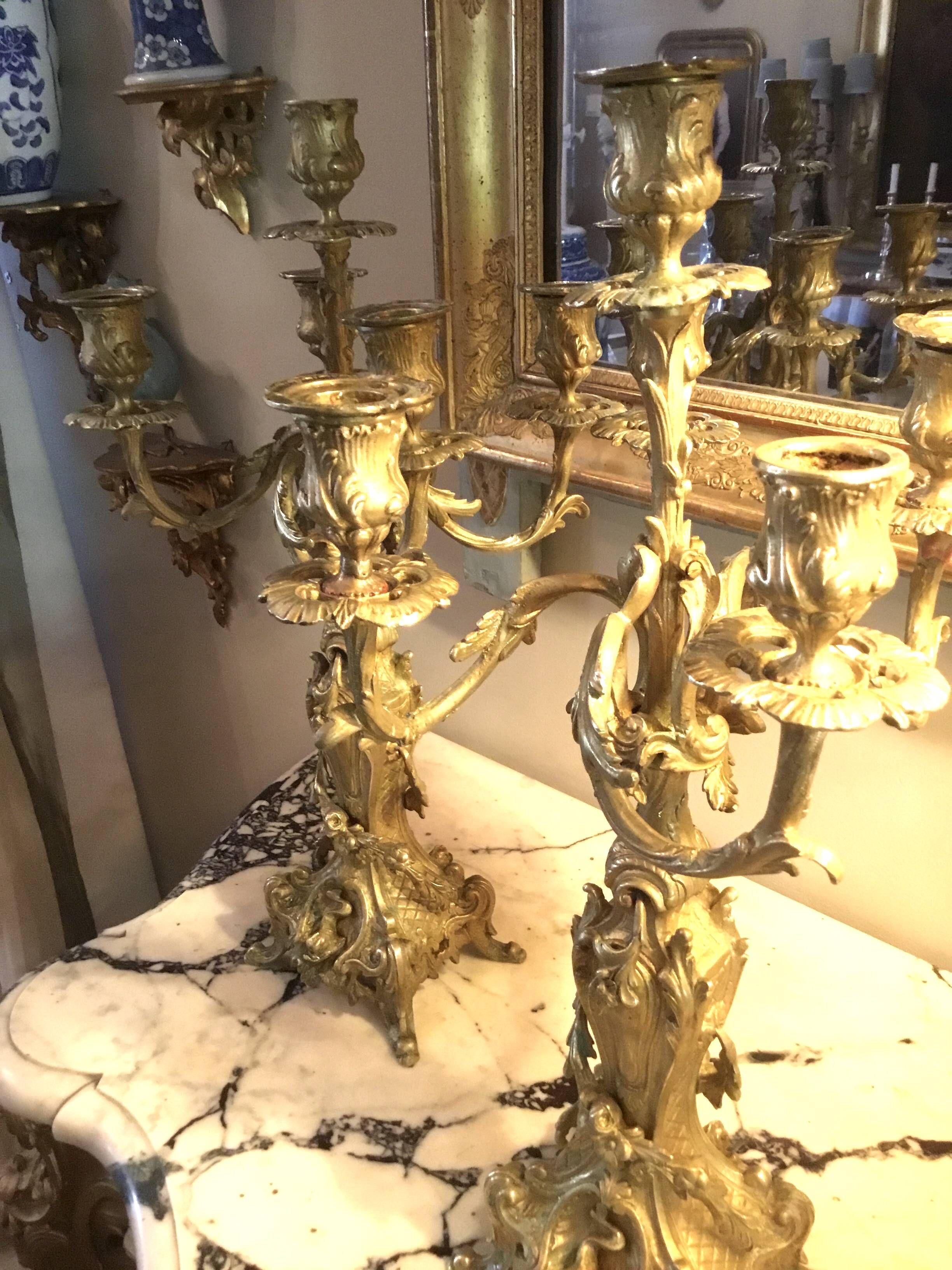 Pair of chiselled and gilded bronze candelabra from the 19th century.