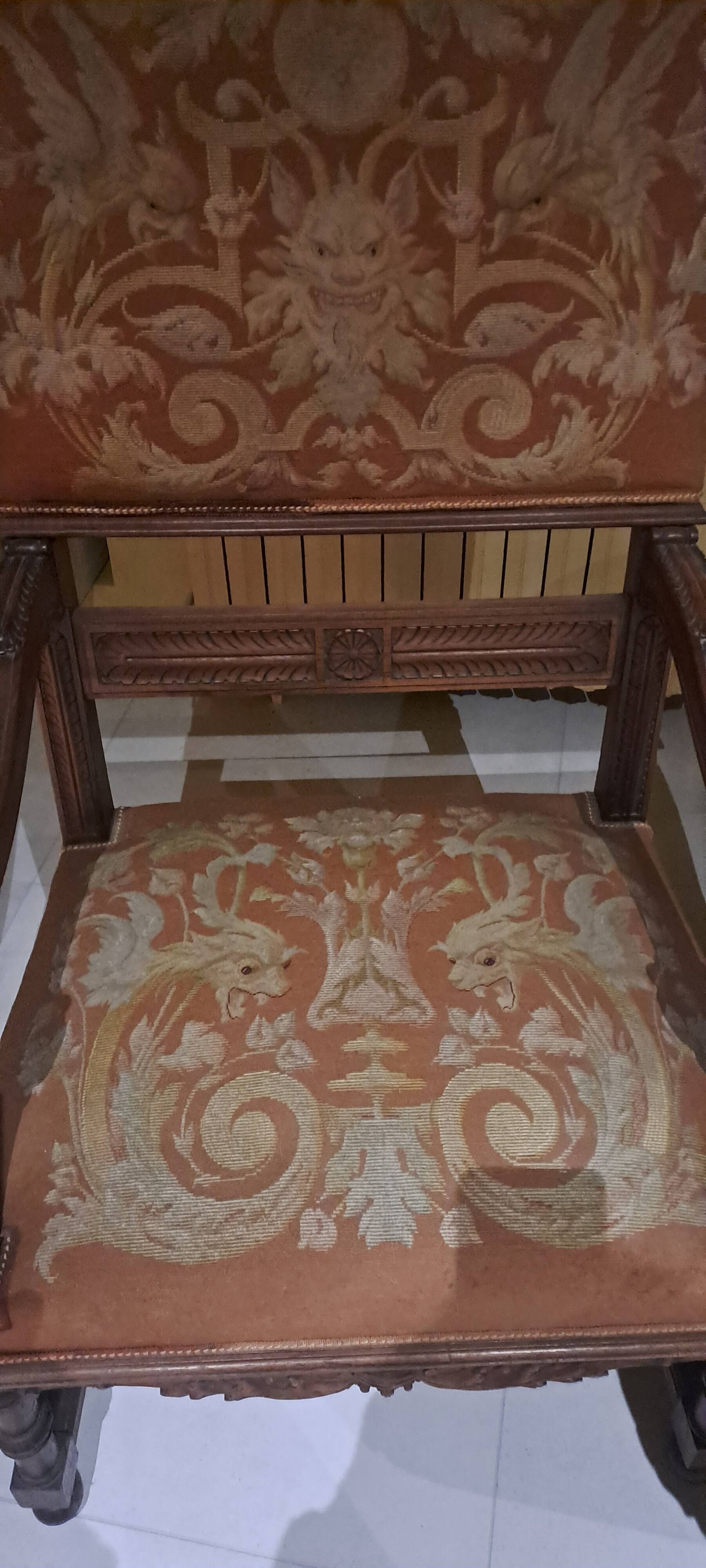 Antique lion head armchair