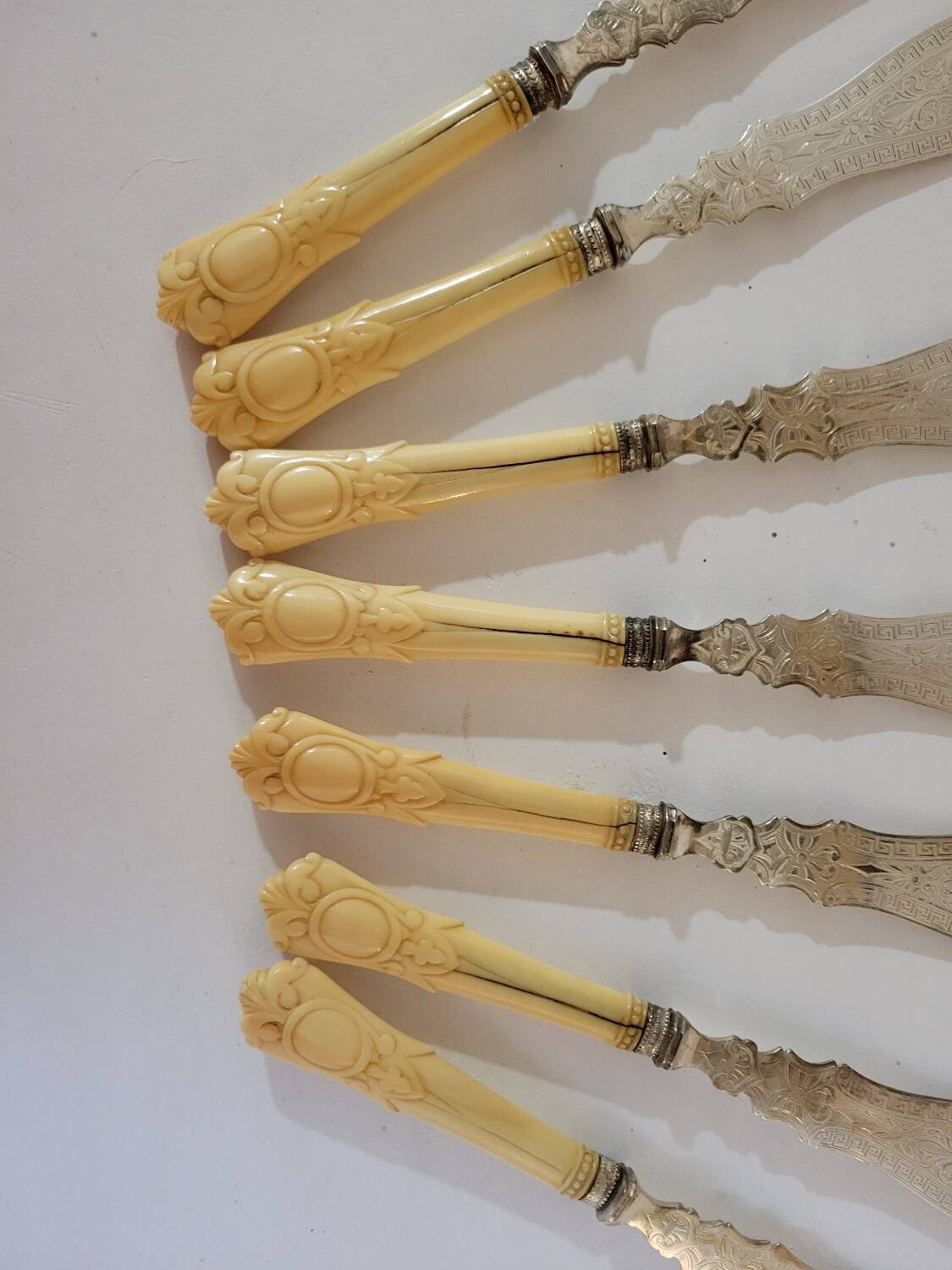 English fish knives in silver and ivory, 19th century
