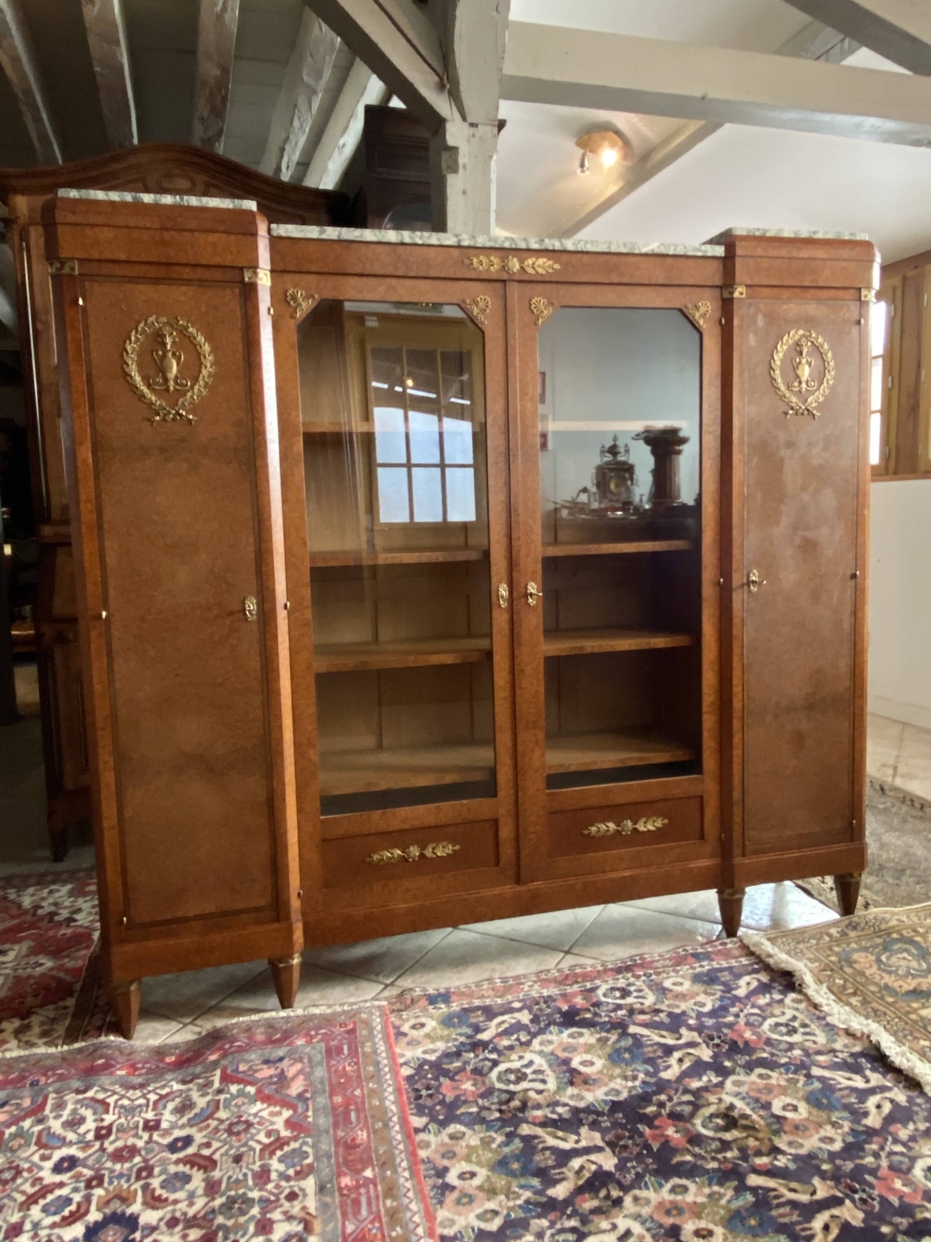Showcase library in Neoclassical style, 1930, walnut burl and bronze.