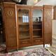Showcase library in Neoclassical style, 1930, walnut burl and bronze.