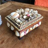 Set of boxes and vintage vase in mini shells