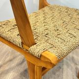 Pair of woven teak armchairs