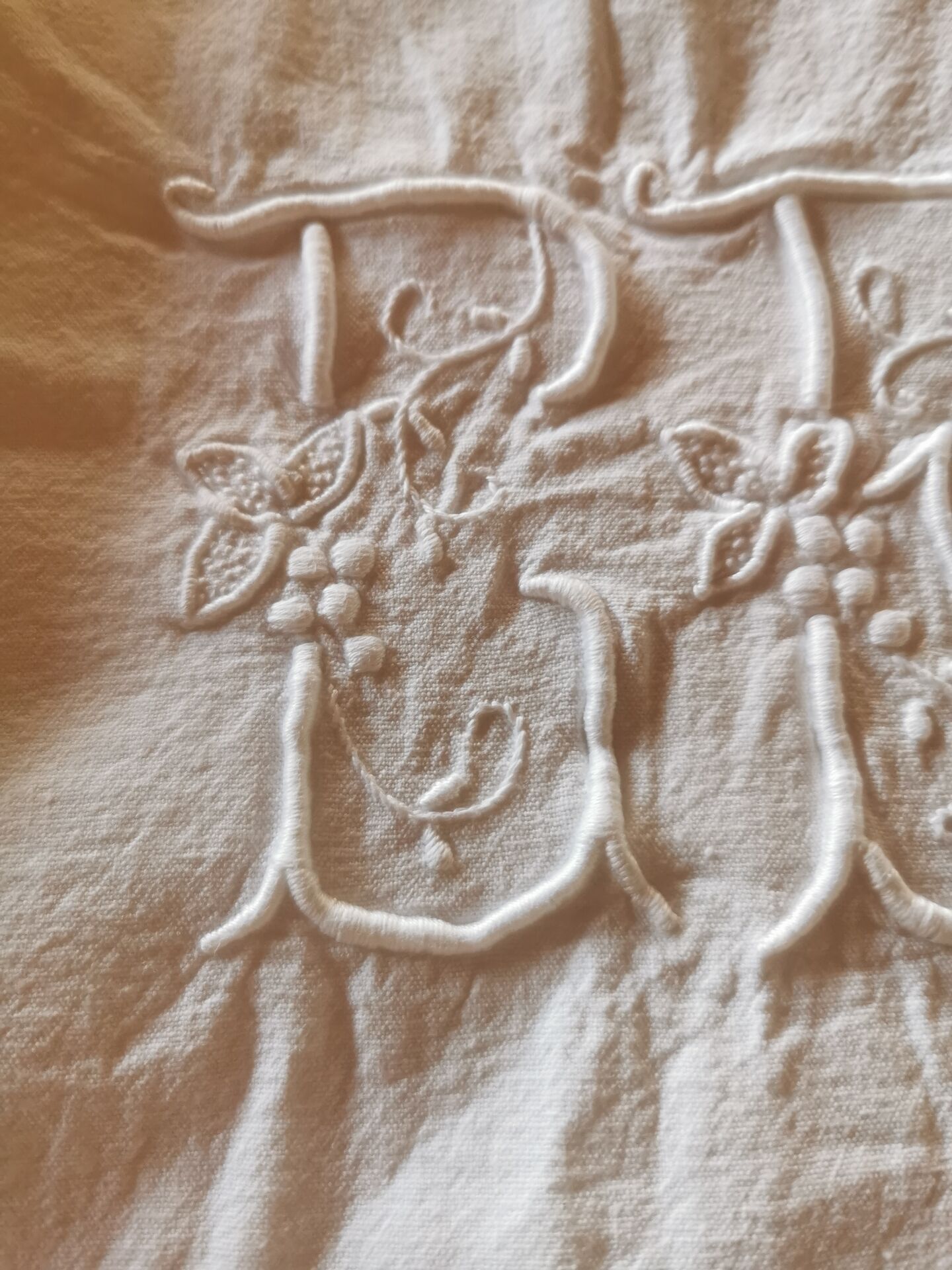 Antique monogrammed fabric