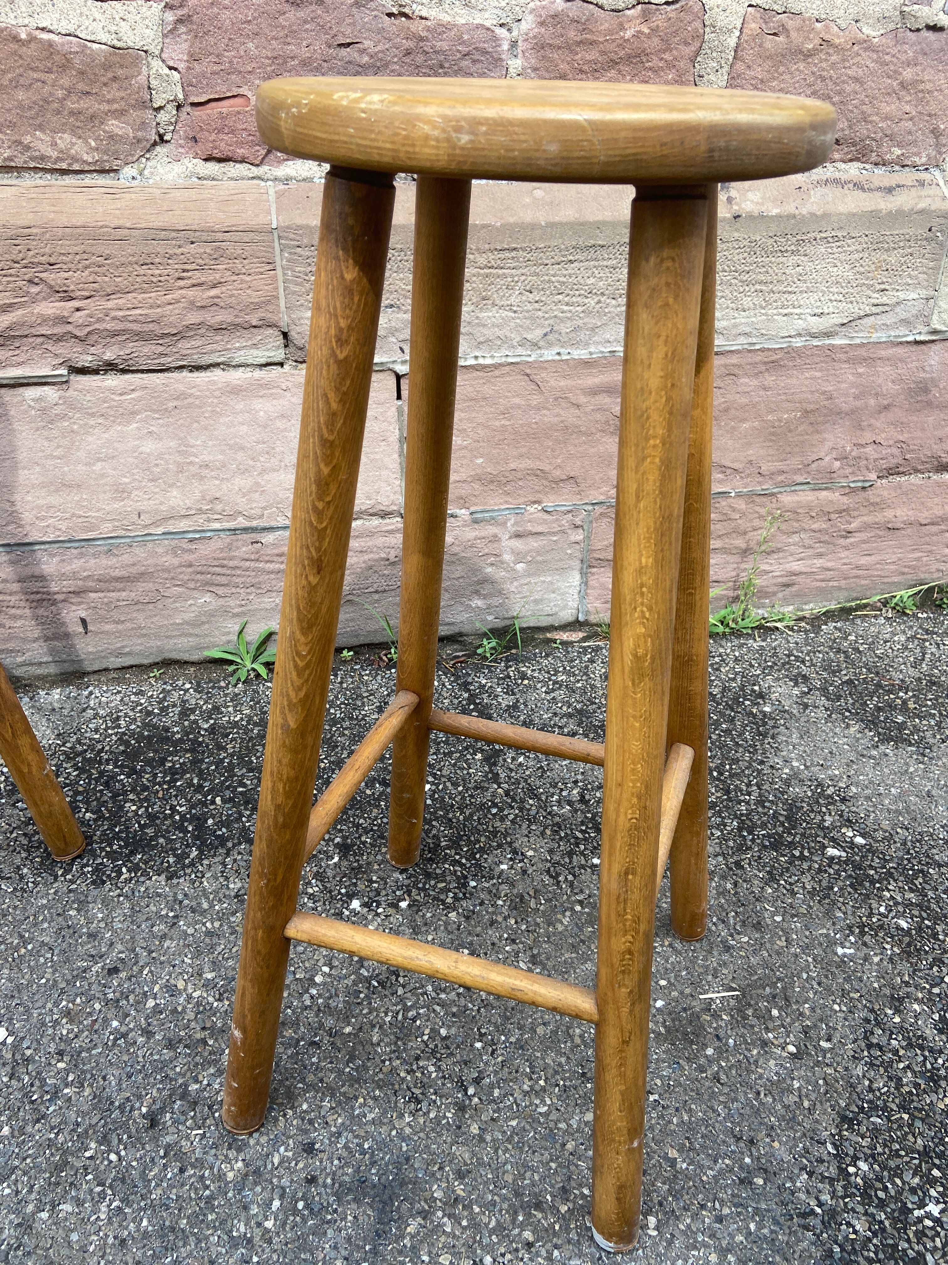 pair of vintage wooden bar stools
